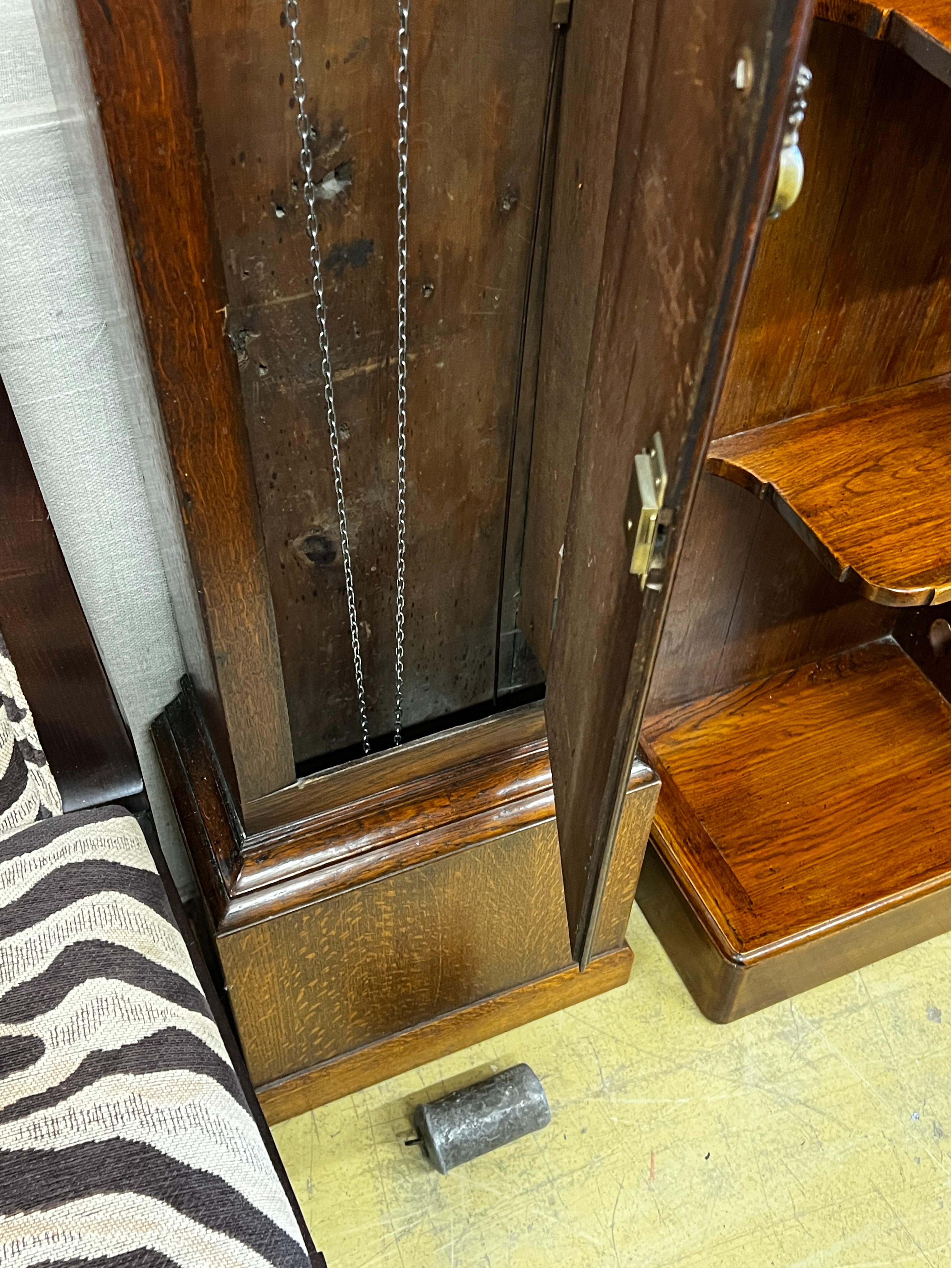 An early 19th century oak 30 hour longcase clock marked M. Irish, Lewes, height 196cm